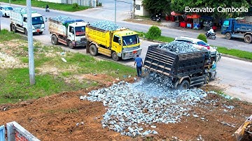 New Action Building New Road By Truck 5 TON Unloading And Bulldozer D20P Pushing Spreading Stone