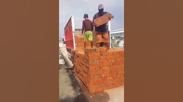unloading red bricks that are ready to be used to build a house or building #constructi #home #brick