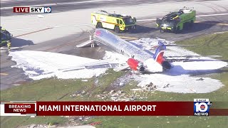 Plane catches on fire at Miami International Airport