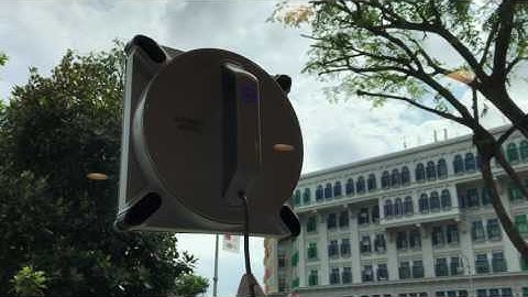 Ecovacs Winbot 950 cleaning a window