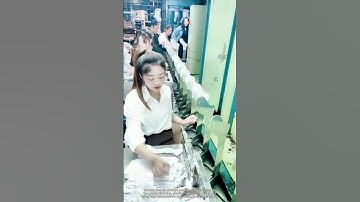Skilled female workers on the production line are shaping socks with precision. #work #amazing