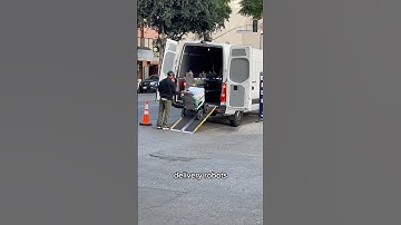 Uber eats sidewalk delivery robots in Downtown LA #artist #money #food #ubereats #doordash #robot