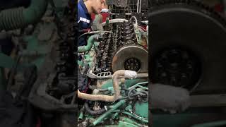 Volvo truck engine.  What is he doing? Truck repair #shorts