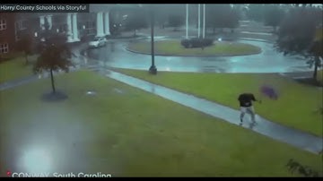 Struck By Lightning! Video Captures the Moment of a man while walking in the storm