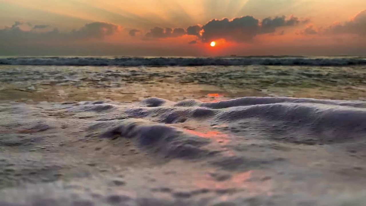 Sunrise with slow motion waves shot in iPhone XS