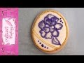 Brush Embroidered Flower on an Egg Shape Sugar Cookie with Royal Icing