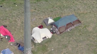 Aurora passes camping ban