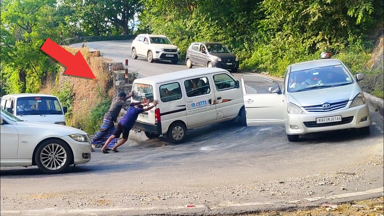 Minivan Stuck on Steep Hairpin Bend, Other Drivers Help Push It
