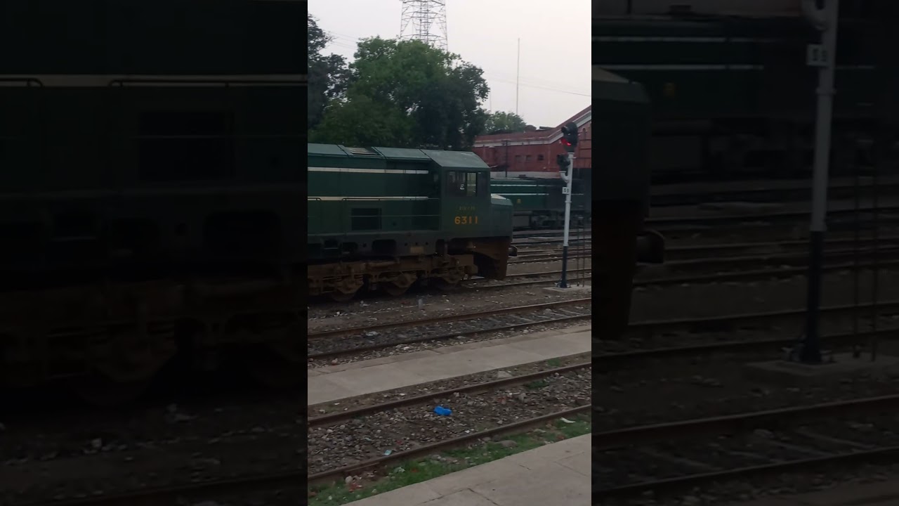 Chinese locomotive ZCU 30 going for journey at Multan cantt railway station 