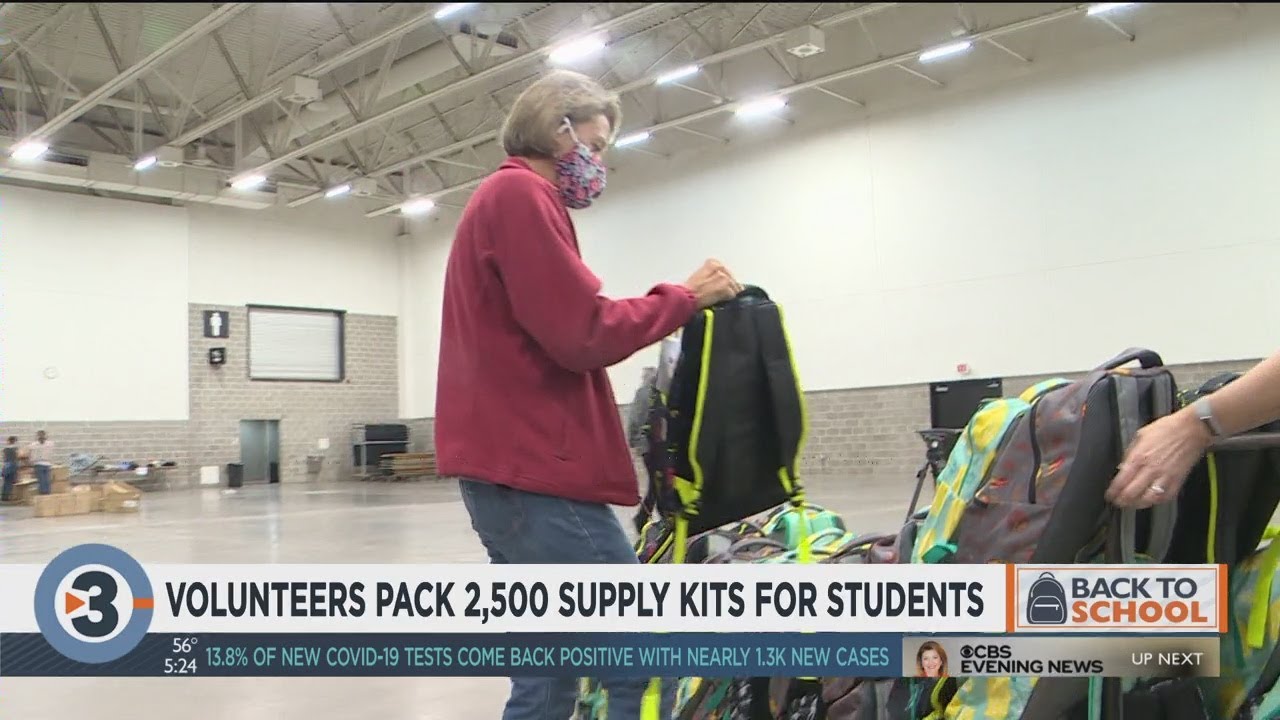 Volunteers pack 2,500 supply kits for students YouTube