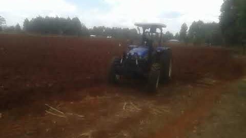 New Holland TT75 ploughing