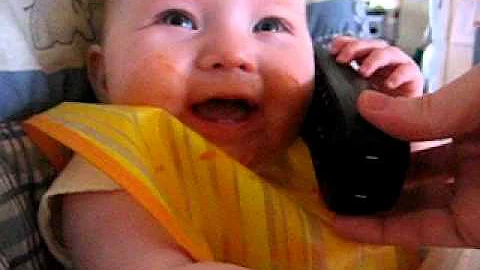 Paige @ 7 months old listening to her Nan Hackett ...