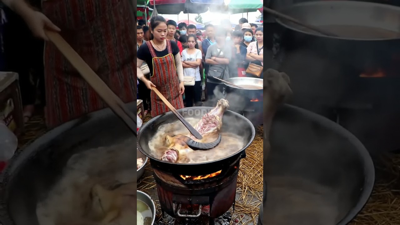 Frying buffalo head at the culinary market.