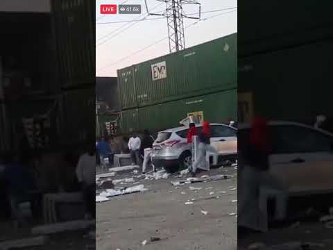 rioters in USA loot moving train
