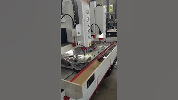Dual spindle simultaneous processing by CNC gantry drilling machine with automatic tool change