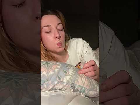 Girl hocking spit into a vial