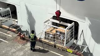 Loading supplies onto the Discovery Princess at Canada Place in Vancouver, BC, Canada