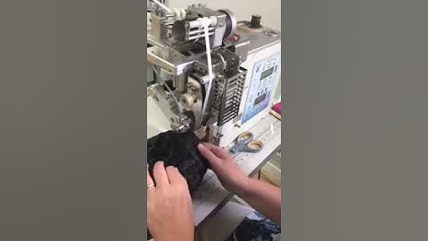 Bonding lay down operation. Sew Systems AT800 machine