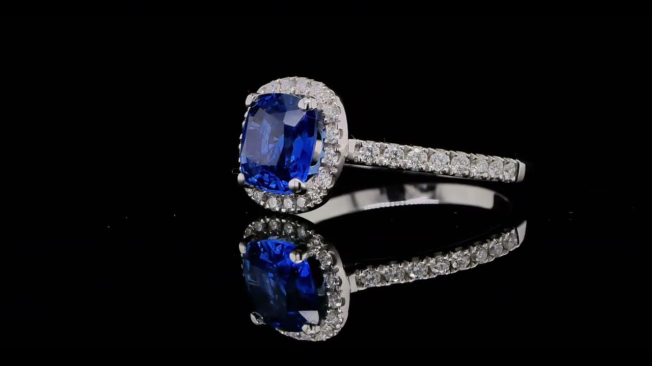 1.48 Ct Cushion-Cut Sapphire Halo Ring In 18K White Gold With Diamond Accents - Orogem Jewelers
