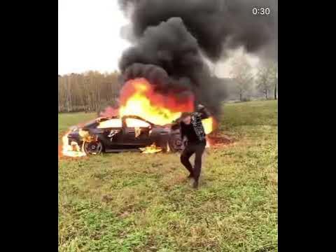 Литвин на фоне горящего