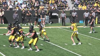 Iowa players, coaches discuss growth of potential starting quarterbacks