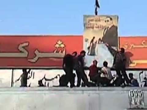Mubarak poster is torn down 25th january 2011 egypt