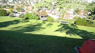 Richard riding big ice block down hill