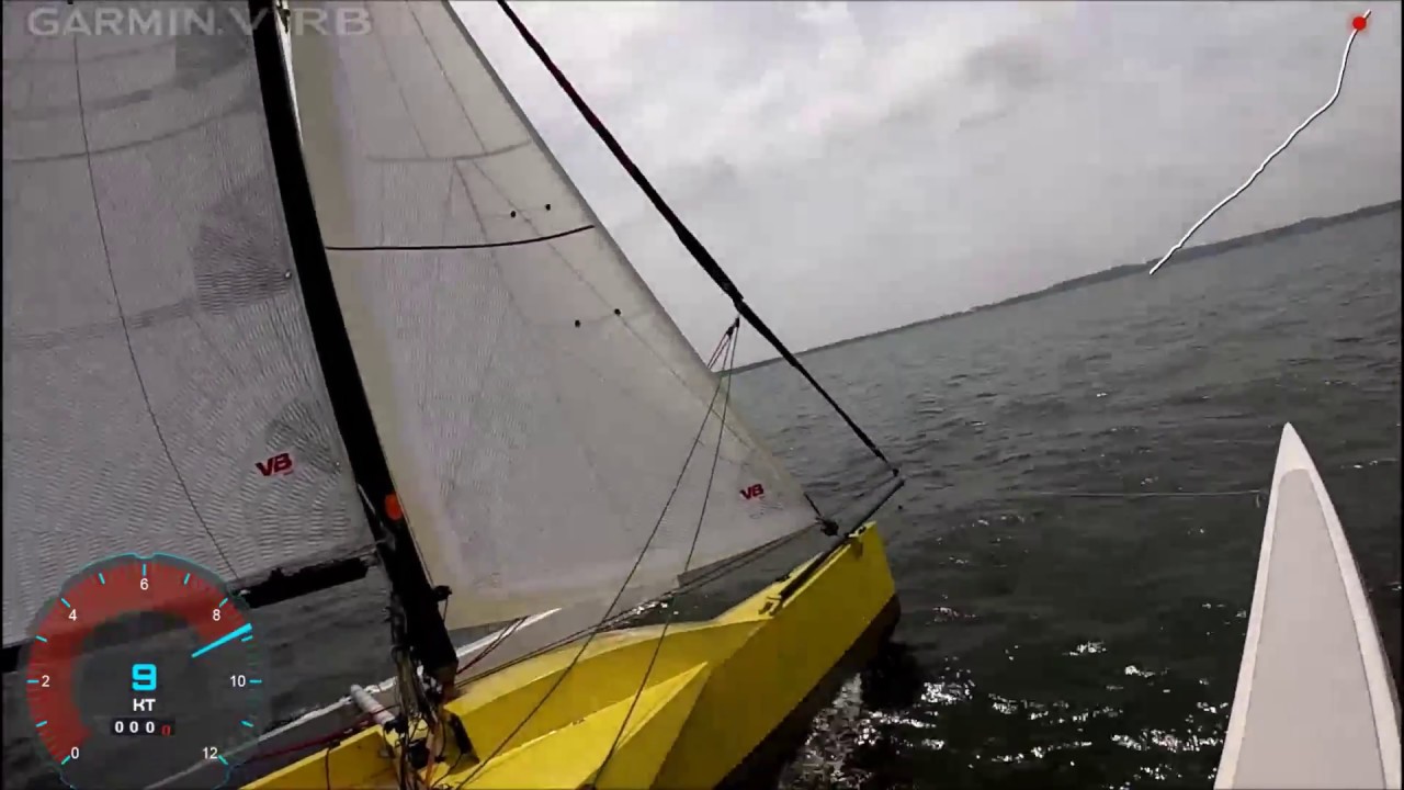 Strike 20 trimaran sailing fast to windward