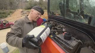 servicing Kubota U27 4 changing hydraulic oil and replacing filters