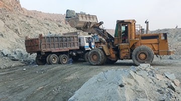 Caterpillar loadar 966E big rocks loading trolley and dampers#video#viralvideo#viralshorts#viral#cat