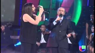 LAURA PAUSINI Y LUCHO GATICA (Q.E.P.D.) cantan  &quot;ES LA HISTORIA DE UN AMOR&quot;