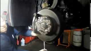 How to replace the front brakes and rotors on a 2010 Honda Accord Profile
