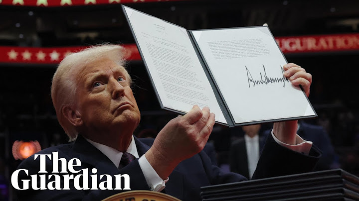 Trump signs a slew of executive orders targeting Biden policies