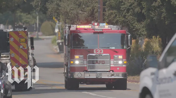 Californians wait out wildfires in emergency evacuation center