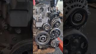 #The mechanic stripping a jazz vtec engine to replace the timing cover
