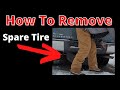 Remove the spare tire off a Chevy Silverado Truck // Lower Spare Tire In A Chevy Truck