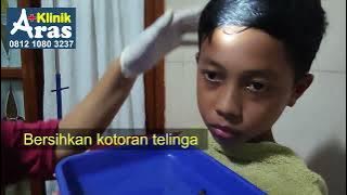 bersihkan kotoran telinga di klinik aras