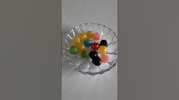 Filling Bowl With HARIBO Dragibus Soft Candy
