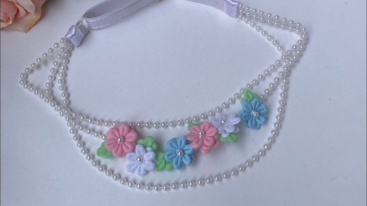 Tiara de luxo para bebê flor prensada