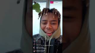 Cordae answering questions on live