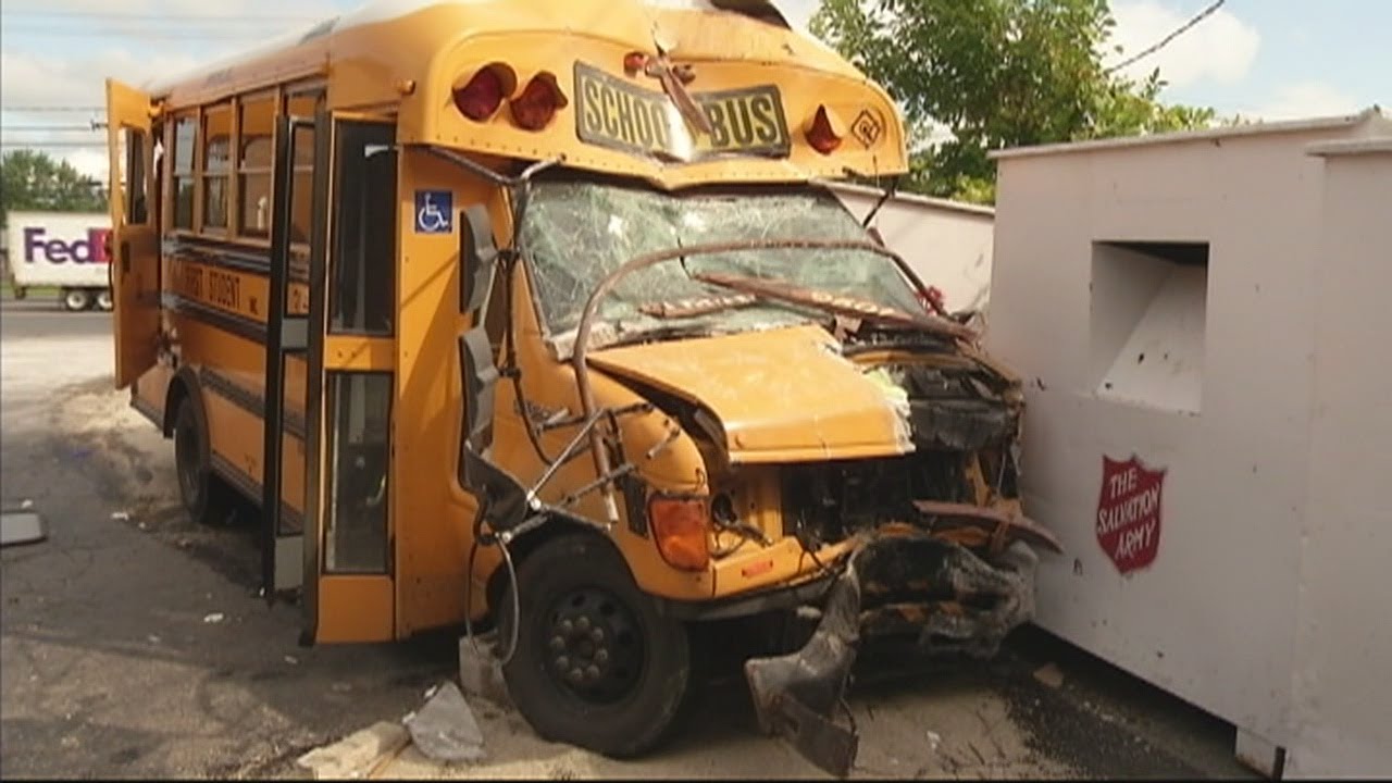School bus slams into building - YouTube