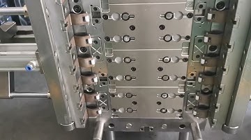 flip top cap mould with in mould closing system