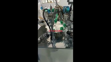 Automatic rotary aerosol bottle cap valve element assembly machine