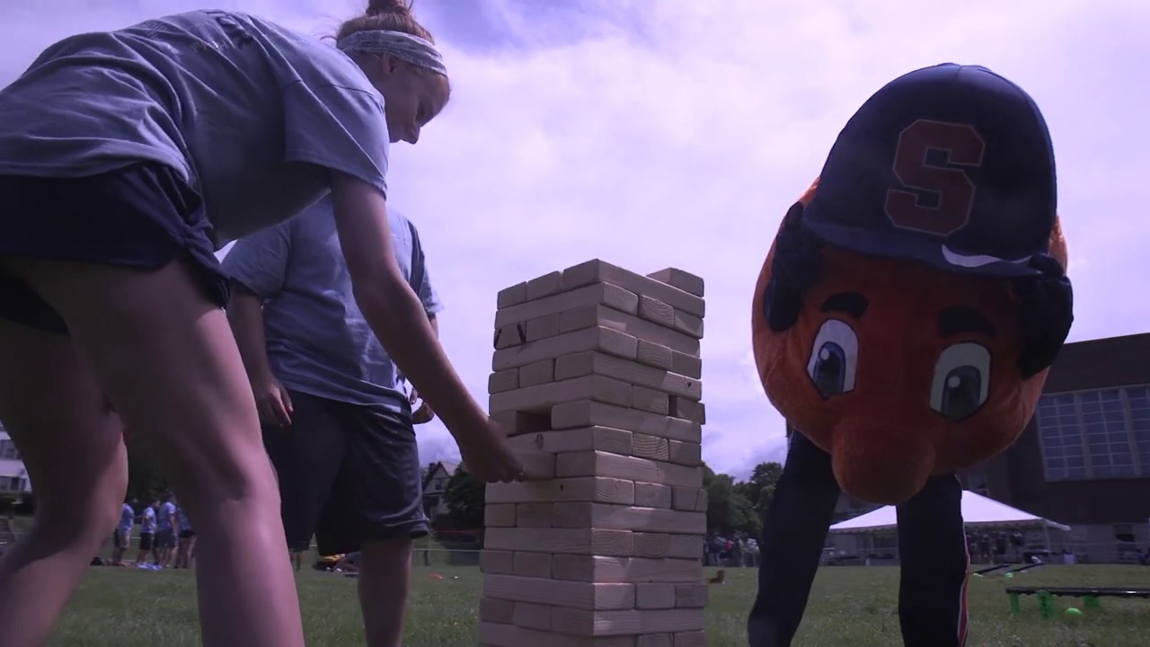 Otto the Orange Challenges Syracuse University Engineering Students to a Jenga Game