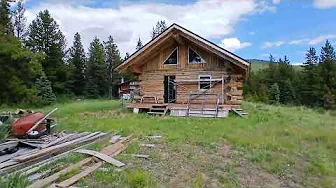  Nordegg trapper cabins nice view along a creek n mountains out on quad trip solo ride  grizzly 700