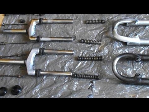 Видео: Как да разглобявате велосипедна вилка