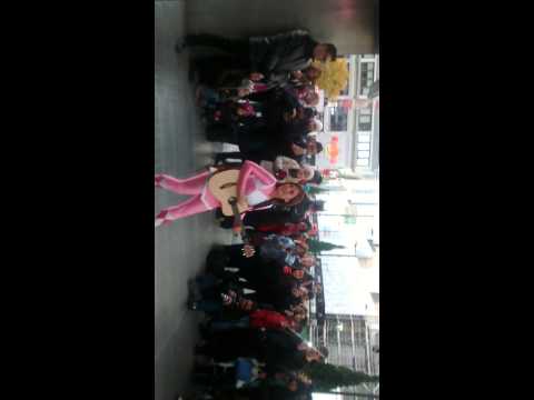 Amy Jo Johnson singing in a pink ranger costume