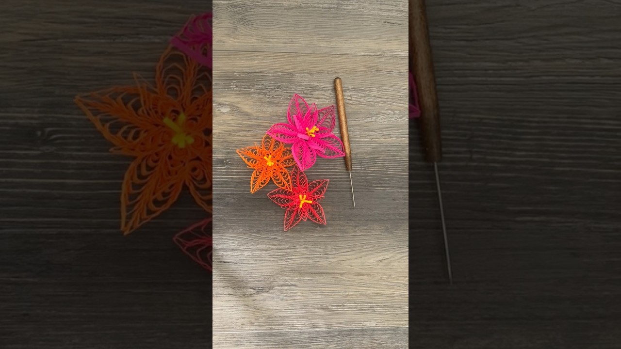 Bright tropical flowers on a quilling comb - Full video to make your own in the comments 