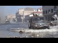 Fighting continues onto flooded streets of sirte