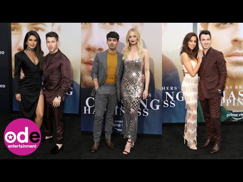 Jonas Brothers arrive for Chasing Happiness premiere